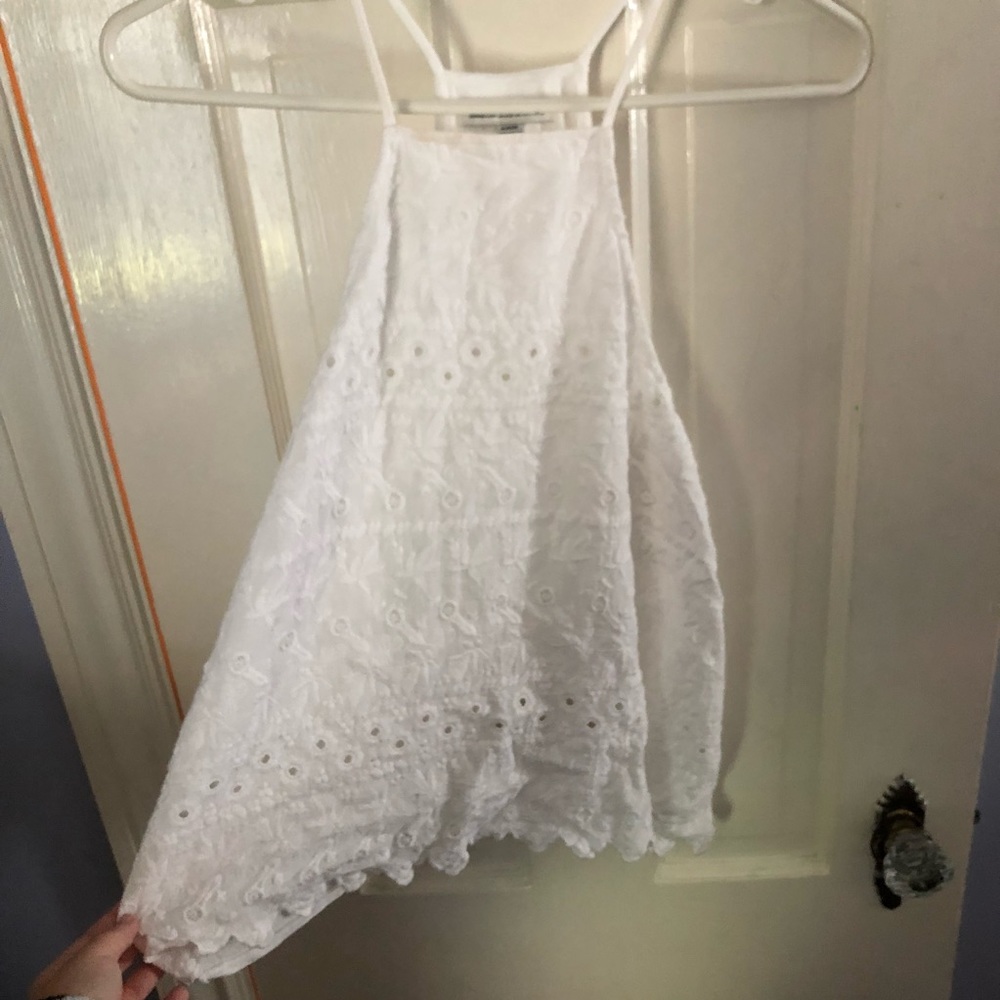 White open back tank top with eyelet lace in front